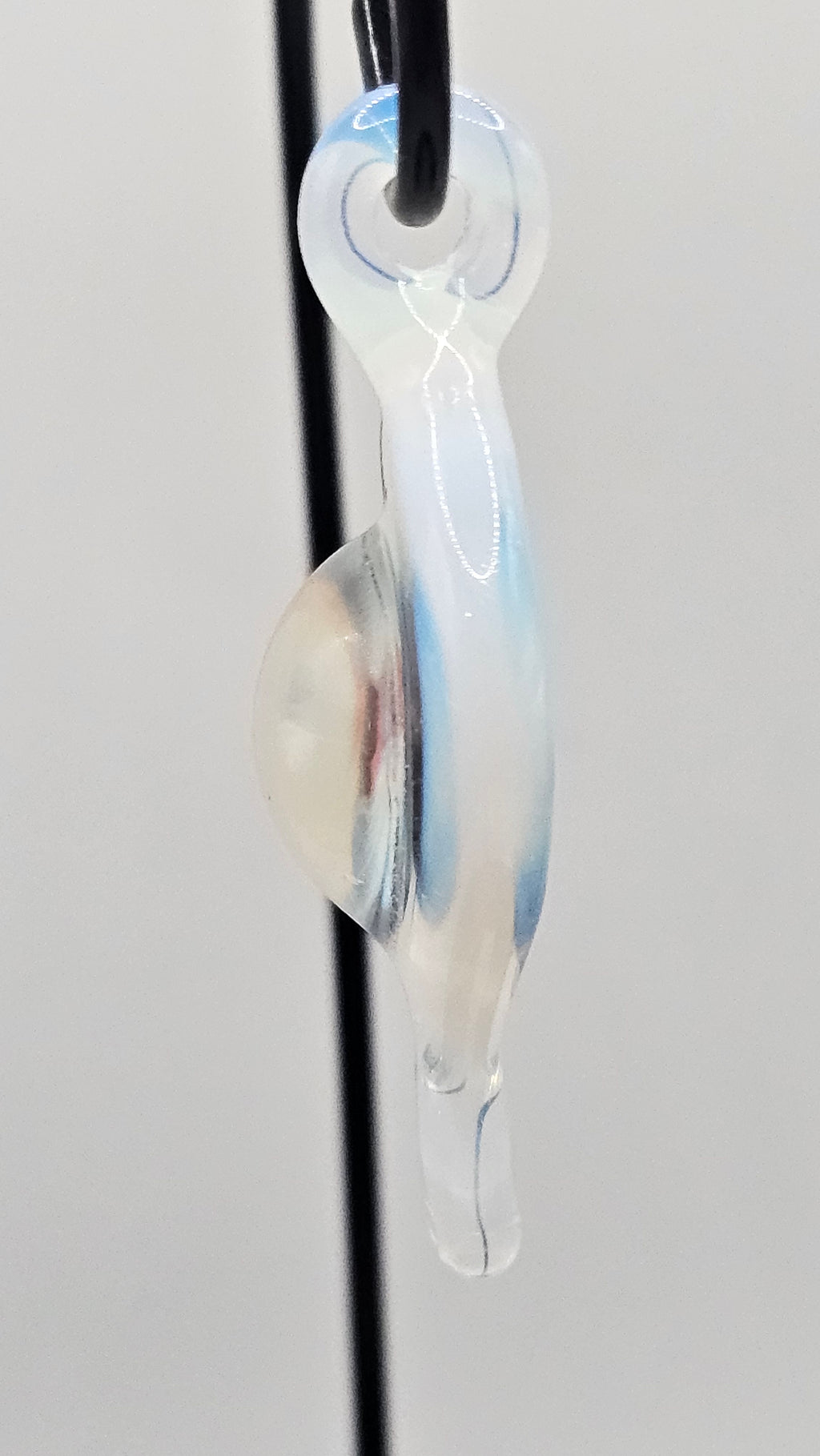 Lumia Veil — Dawnspun Spiral Pendant